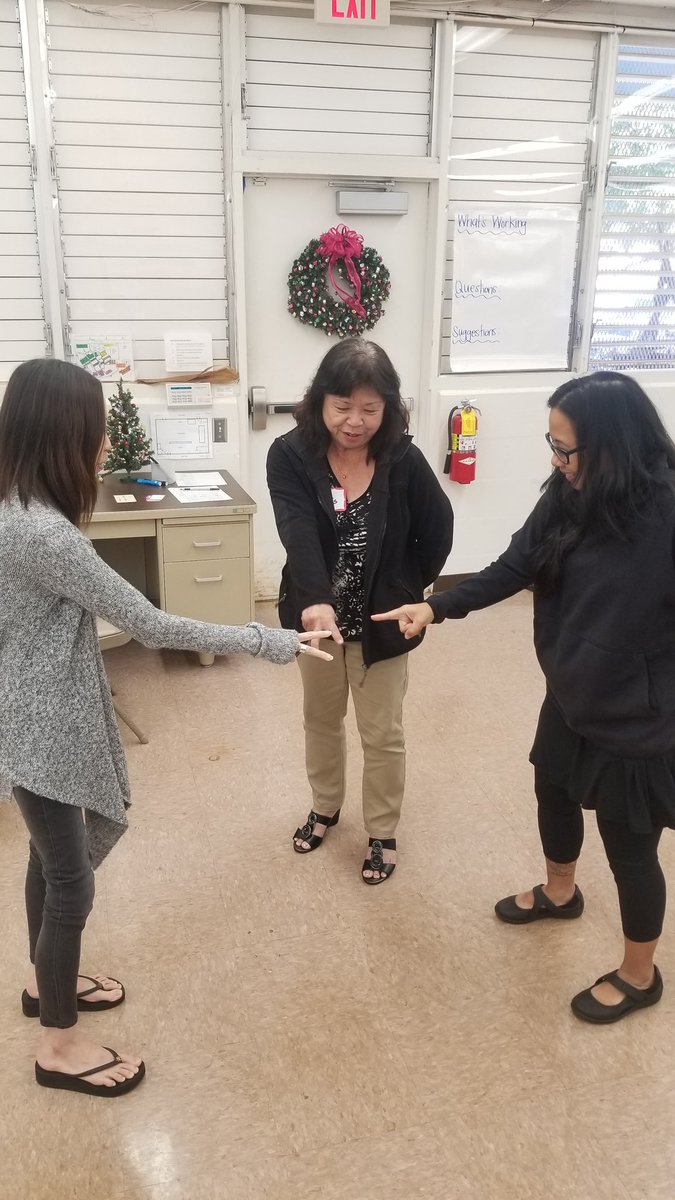 Brain break at the @InductionHi, playing jun ken po with math addition. Hysterical! #sel #mentorconversations @HIDOE808 @HSG_HI #hsghi