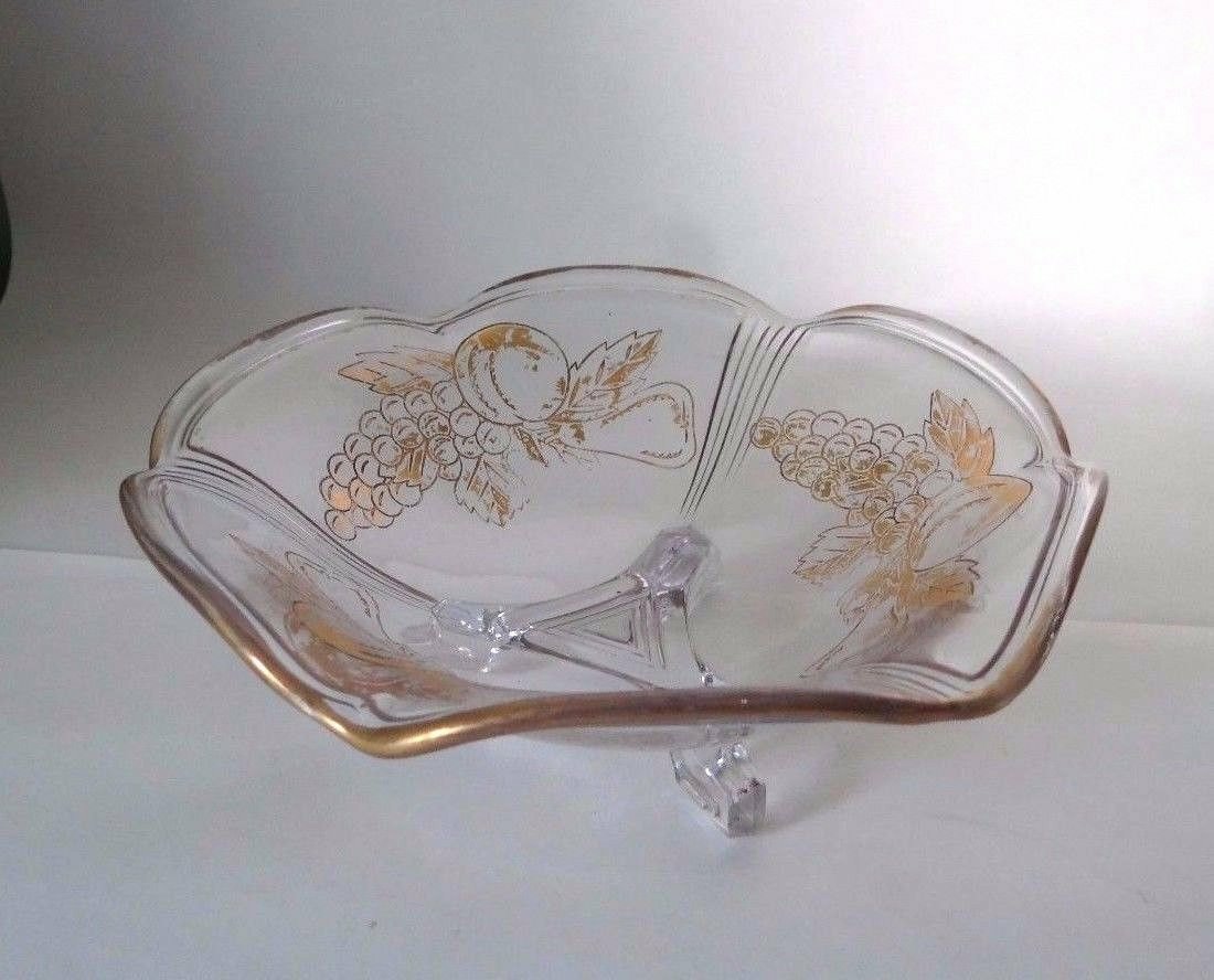 Excited to share the latest addition to my #etsy shop: Glass Fruit dish from the 1950s, grape design #housewares #gold #clear #housewarming #christmas #glass #footedcandydish #vintagecandydish #candydish etsy.me/2rbC4xP