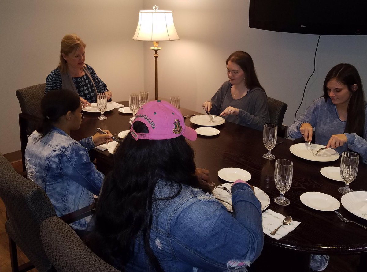 FcsDelta's tweet image. Lisa Lacy teaching dining etiquette and table setting in FCS 447 today.