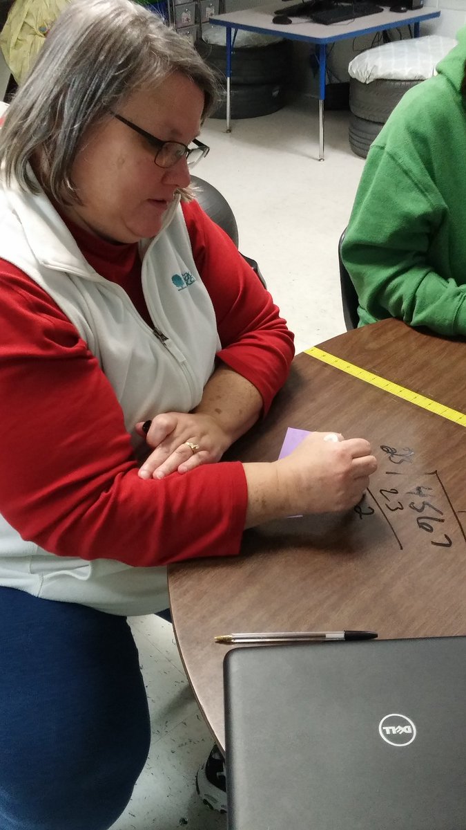 ksimpson52's tweet photo. So proud of our 5th grade parents who are not afraid to work math problems on the table...just like their children. #CMZ #ACTGODO https://t.co/XWYsGUrRrM