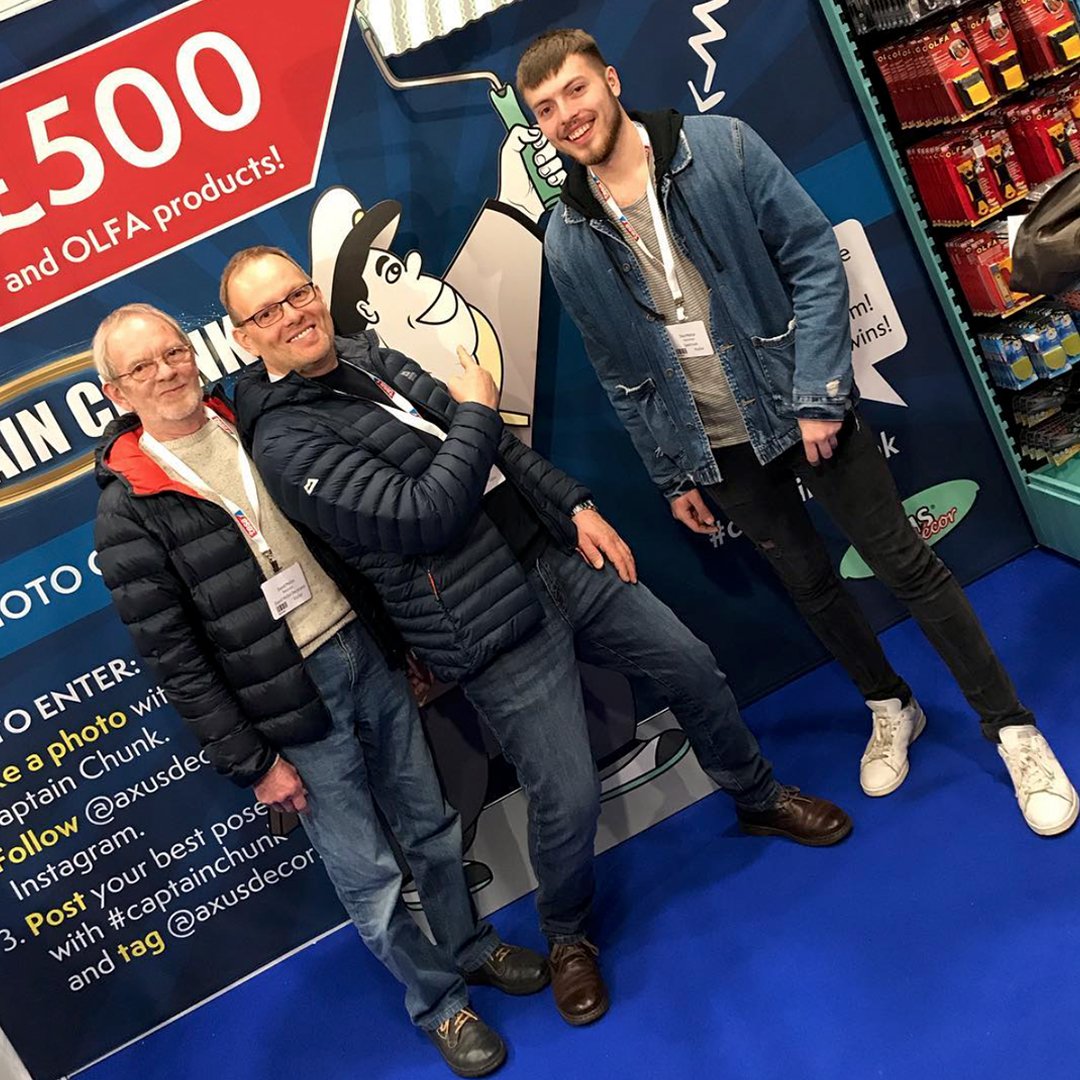 AxusDecor's tweet photo. Congratulations to our winner of the Captain Chunk Photo Contest Howard Mellor. The winner was chosen by the organisers of the P&D Show for having three generations in one picture. #axusdecor #designedbydecorators #PDShow2018 #stand27 #captainchunk #photocontest #winner #olfa https://t.co/VMKlqZK95g