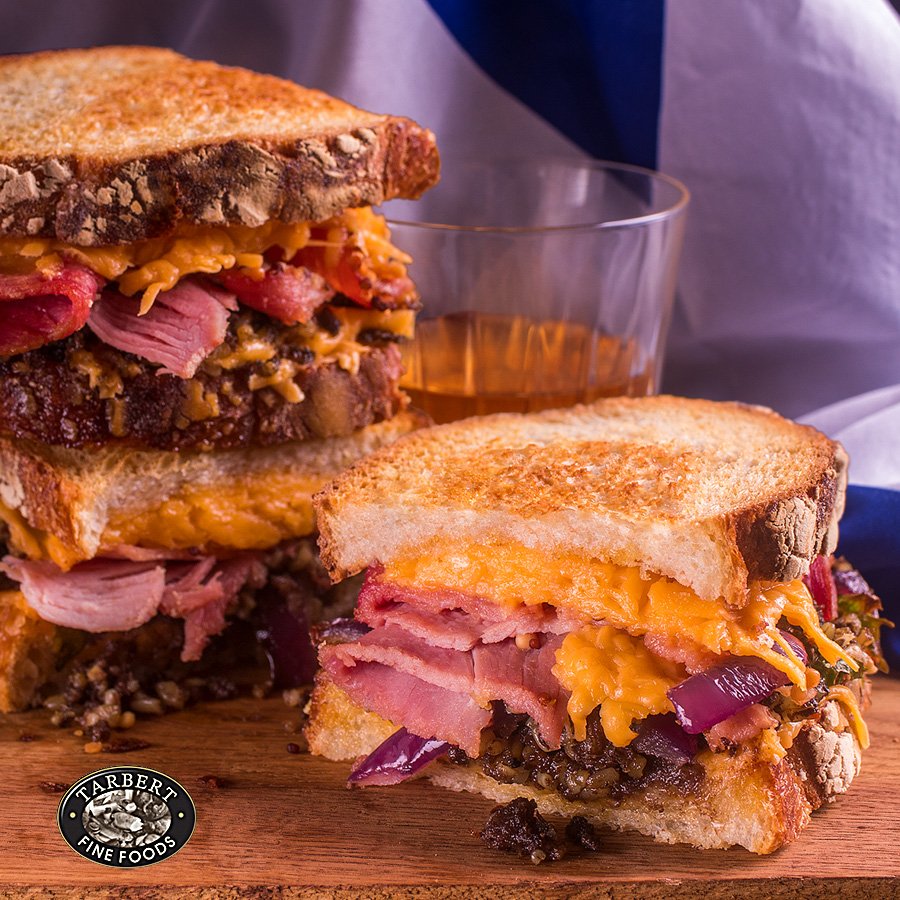 Happy #StAndrewsDay everyone! We're celebrating here with a warm haggis and Arran mustard ham toastie and of course a wee dram of whisky