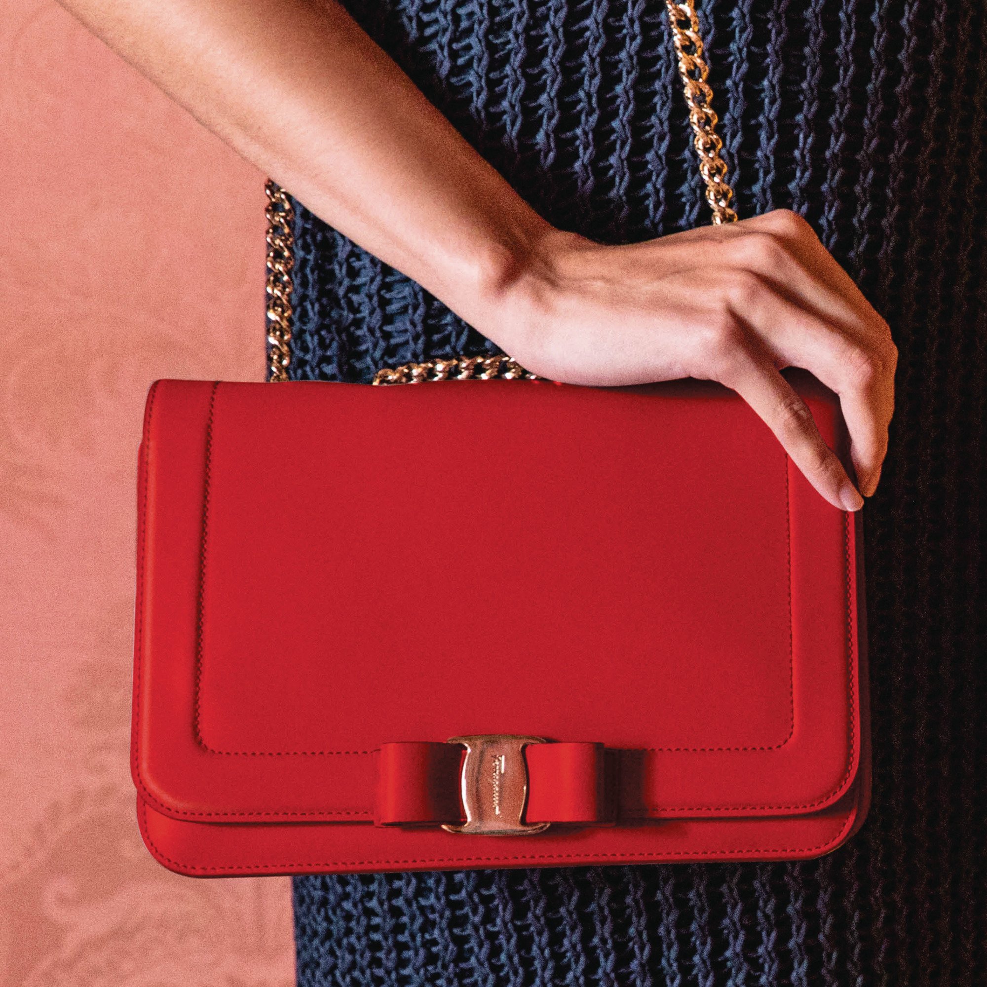 FERRAGAMO on X: A fiery red Vara Bow bag brings life to the daily