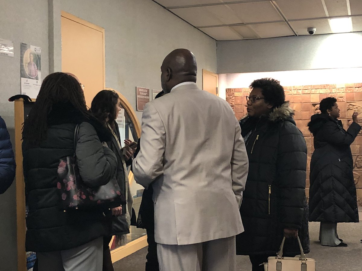 Some of KNHS’ staff speaking with Sid Ellis, ED at the Douglas Community Association for the ribbon cutting ceremony for the new Financial Opportunities Center on Kalamazoo’s northside.