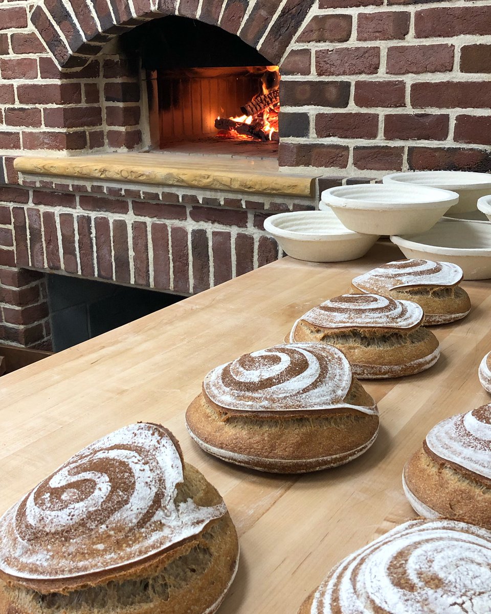ESFoodLab's tweet image. 1st loaves of bread fresh from the bread oven!

Check out the swirl on top. It’s our logo that is based on the human fingerprint☝️

#bread #breadmaking #breadoven #realfood #eatlikehumansagain #esfl #carbs #sourdough #fermentedfoods #nofilterboxing