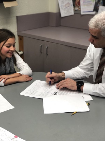 GainfieldSchool's tweet photo. Before he was a principal, Mr. Romeo was a teacher... Enjoying writing conferences with our awesome authors! #GESwrites https://t.co/fXRDTrBUmS