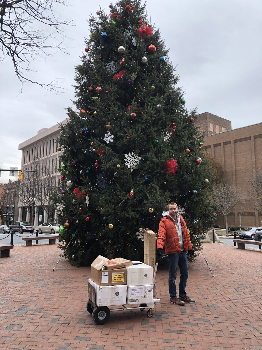 CPOSC's tweet image. @JasonStoltz, our volunteer sponsorship coordinator and a super cool guy, begrudgingly paused #CPOSC setup chores to get a festive photo in #lancastersquare! #cposcx would not be possible without people like him!