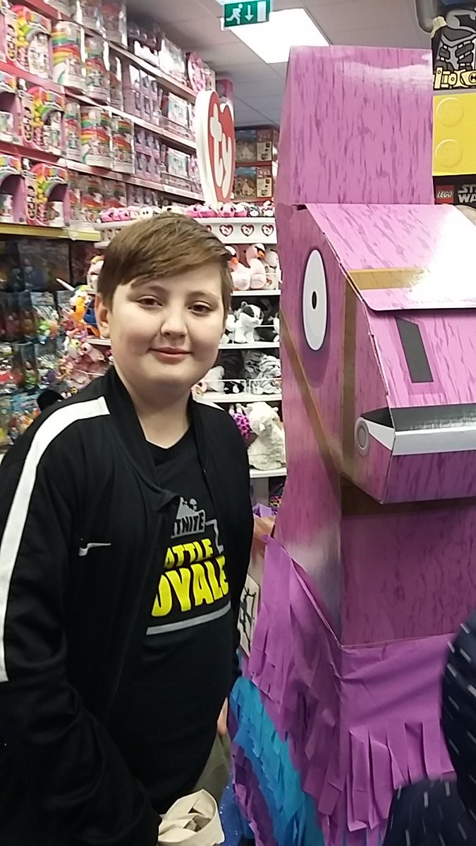 LauraB4rk's tweet photo. @SmythsToysUK loved the @FortniteGame event at your tamworth store.  I now have three very happy children. Especially my daughter who won on the raffle  #fortnite #smythstoys #midnightevent #no1 #loveit https://t.co/MmNWNDgrih