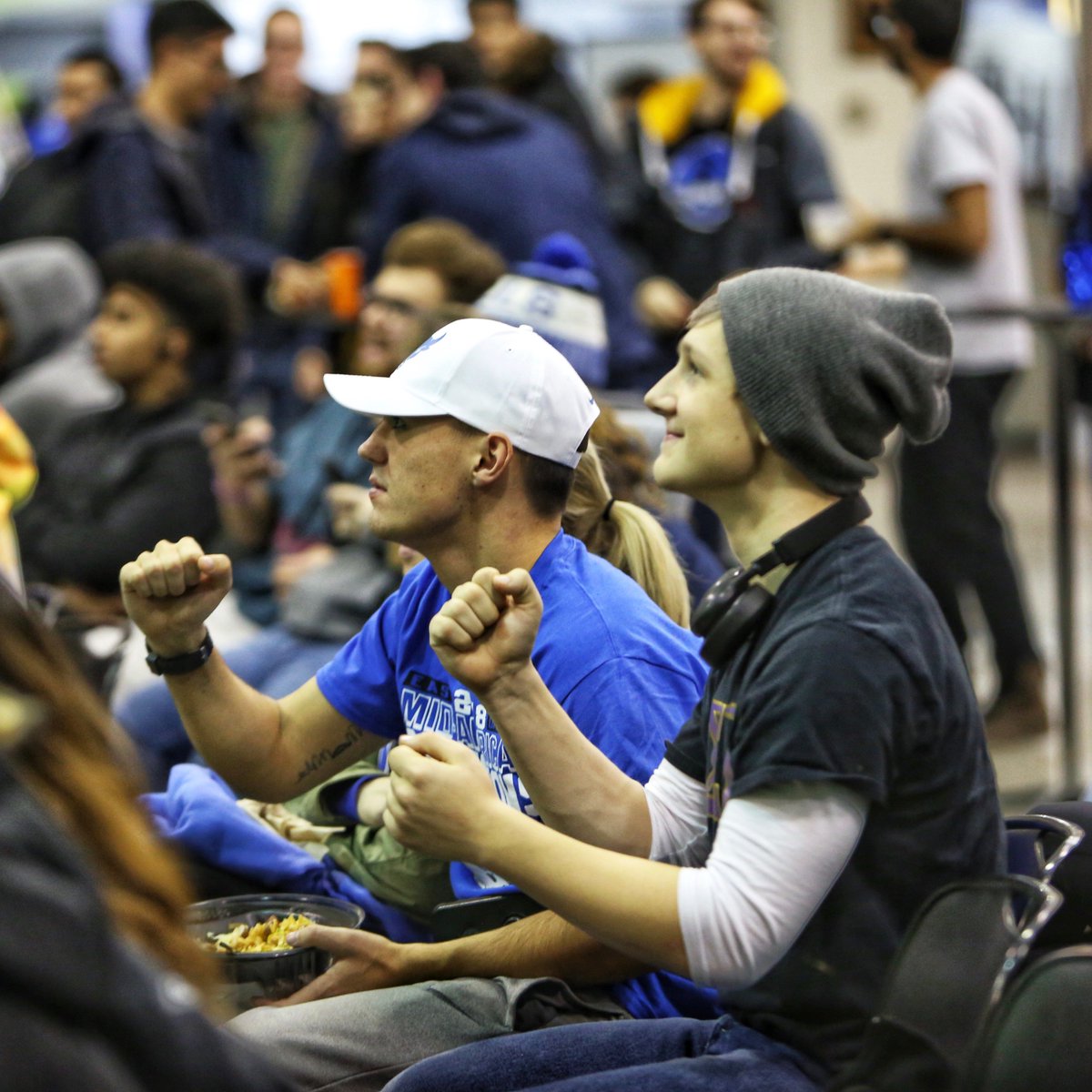 Students cheering on the Bulls in the Student Union