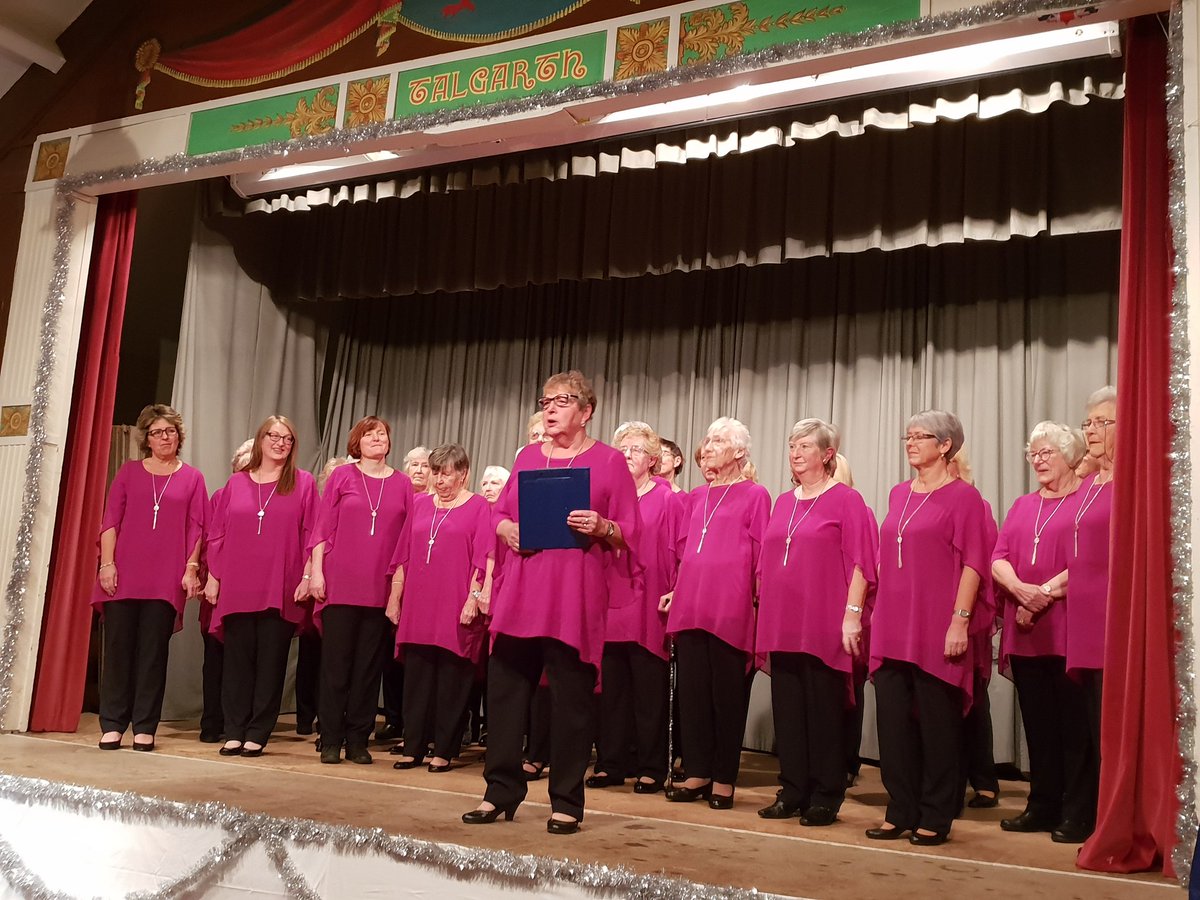 WmPowell2021's tweet photo. .@CaerphillyChoir under their new musical director, Ellie Baker, wowing a packed #Talgarth Town Hall for tonight's @RABIcymru_wales #ChristmasConcert 🎅 https://t.co/wUBdPjj5gr