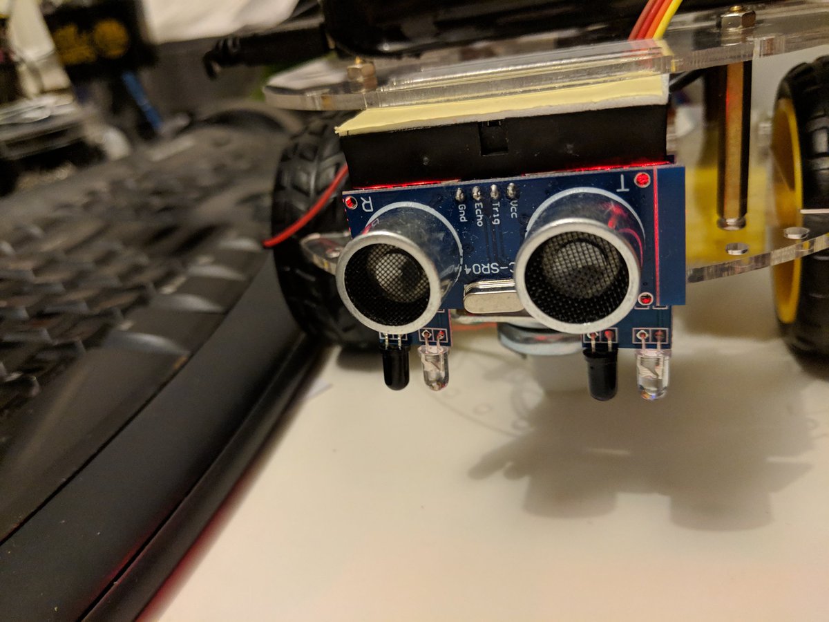 sla_shalafi's tweet image. Updated front of my robot car. Old distance sensor to avoid collisions, now also IR sensors to follow lines. #AndroidThings