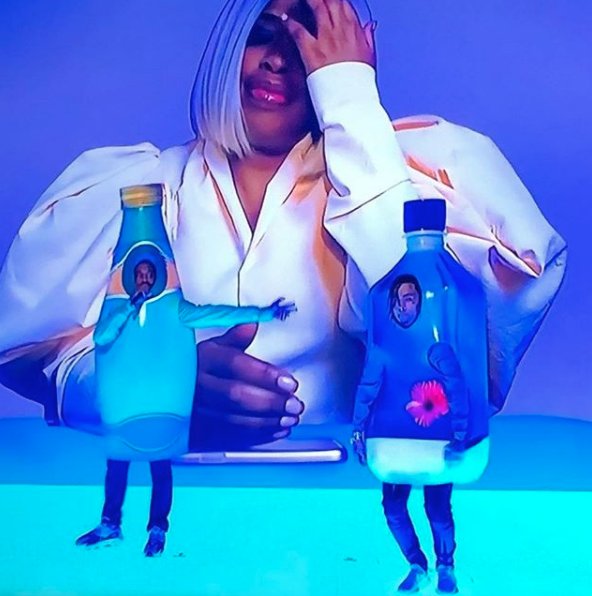 Kanye performing in a Perrier costume on SNL.