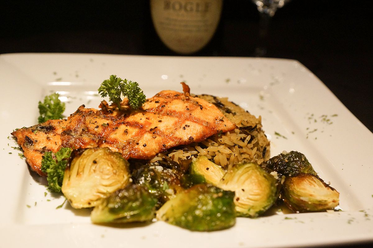 Don't miss this catch of a delicious Grilled Steelhead!
Featured with our wild rice and roasted brussel sprouts
Make sure to pair it with a bottle of wine!