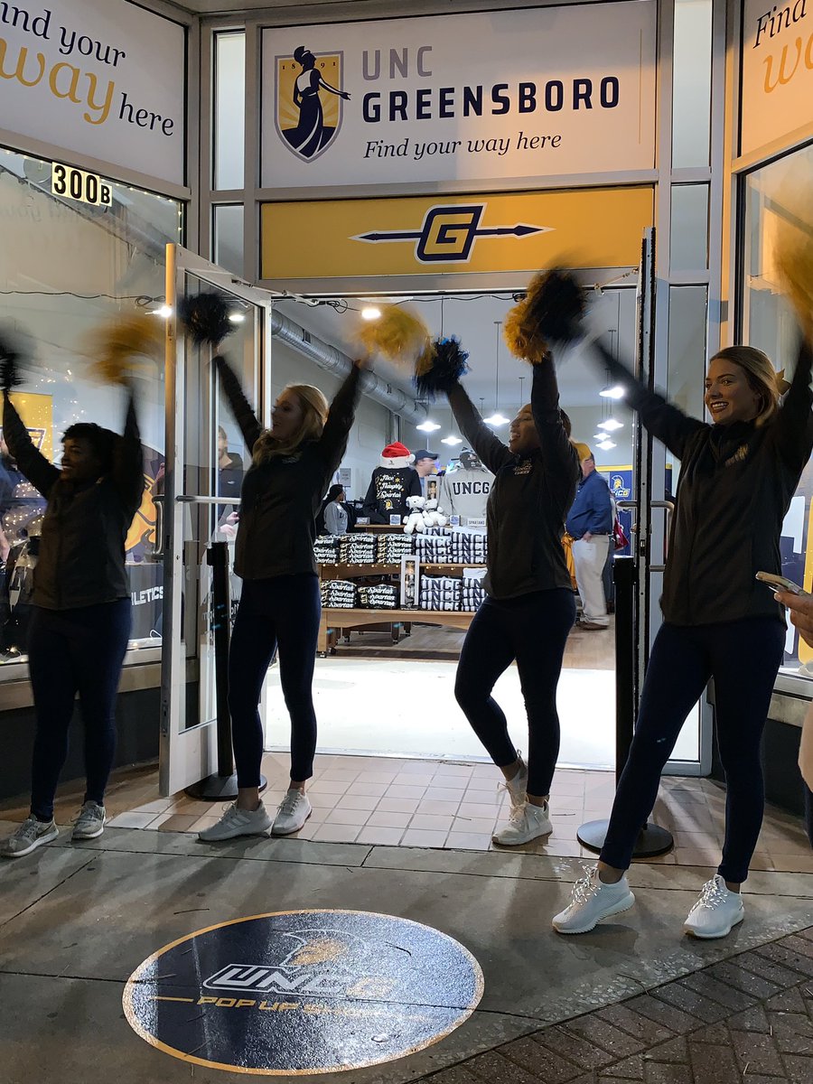 UNCG's tweet photo. Stop by our holiday Pop Up Shop on S. Elm Street! Tonight we have @uncgarts Instrument Petting Zoo, free UNCG swag, @uncgsports is selling @UNCGBasketball tickets, and @UNCGcheer is here to spread Spartan Spirit! @UNCGBookstore
#UNCGWay #letsgoG https://t.co/C59Ecl9m7s