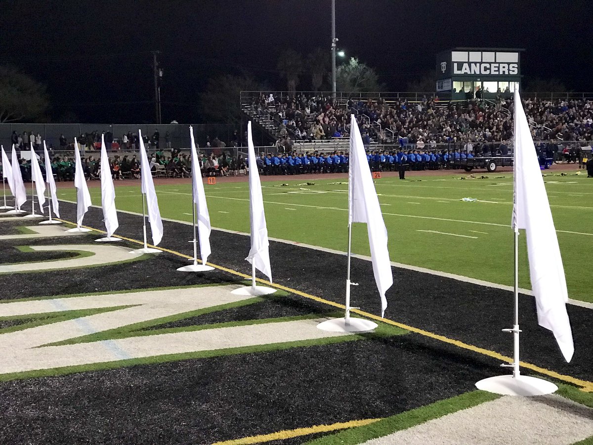 vmiracleCNN's tweet image. 12 flags for the 12 victims of the #BorderlineShooting. Tonight, high school bands affected by the #WoolseyFire and #ThousandOaksShooting are performing and coming together after a trying few weeks.