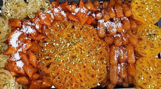 Iran_Style's tweet photo. #SweetSaturday: The very sweet, syrupy & wintery medley of #Zulbia #Bamieh & #GoosheFil with a hint of #RoseWater to compliment a strong hot cup of #Persian tea. Via #AlirezaAkhoondzadeh #PersianFood #lifestyle https://t.co/oO76DYmGd0