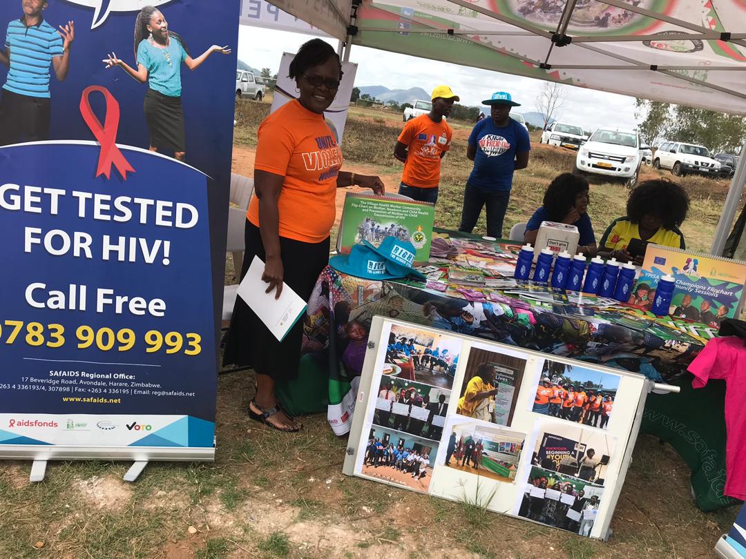 SAfAIDS's tweet photo. SAfAIDS joins the rest of the world in commemorating #WorldAIDSDay under the theme #KnowYourStatus". SAfAIDS Zimbabwe currently in Glendale Mazowe at Rujeko Secondary with @naczim and @MoHCCZim showcasing #HIV interventions in Zimbabwe. @LoisChingandu @Rouzeh https://t.co/jkEgBRrplz
