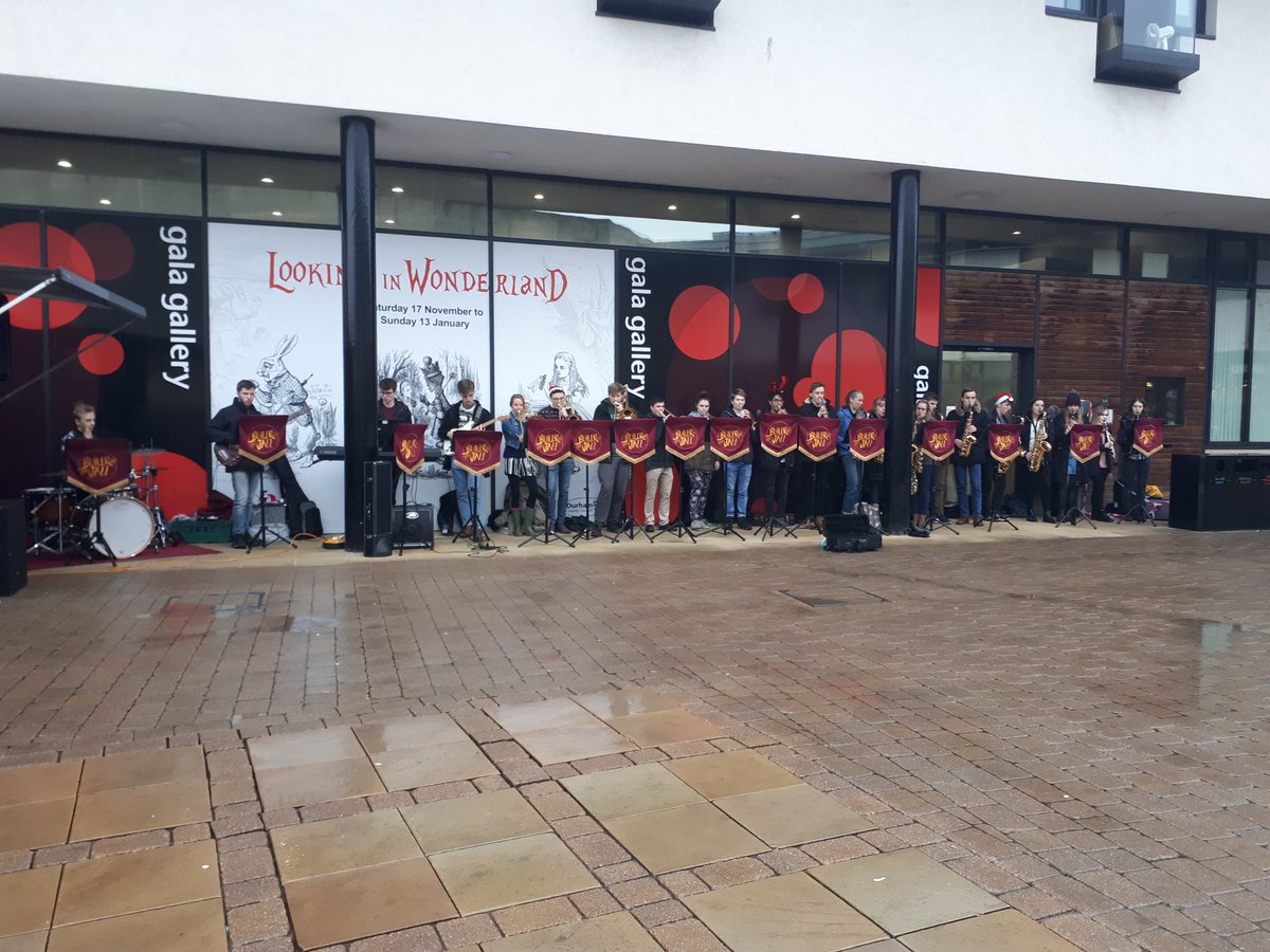 butler_jazz's tweet photo. Despite the wet weather, we had a ball playing at Durham Christmas Markets 🎄 Thanks to everyone who  helped us collect for @VeteransatEase ! https://t.co/qpWlEuQHku