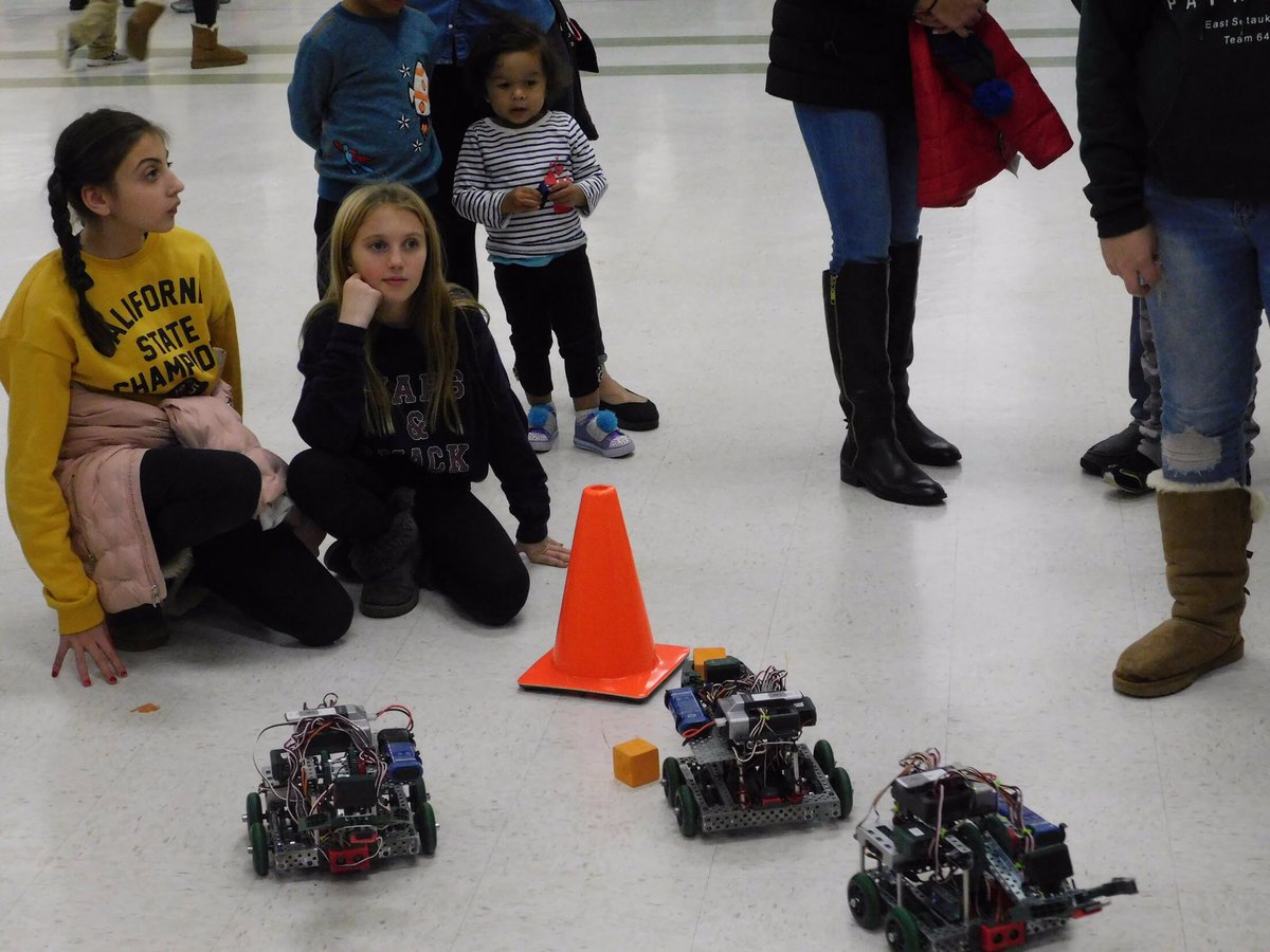 TheIronPatriots's tweet photo. We had a blast at Three Village STEM Night! The kids loved controlling our VEX Squarebots and watching last year’s competition robot. 🤖👍 https://t.co/eKB2xDVq8X