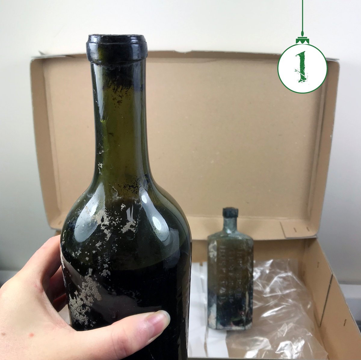 CotswoldArch's tweet photo. #ArchiveCalendar Day 1!
A bottle of genuine Victorian #wine, still with the cork (miraculous around here!) and a curious bottle of... something that smells very medicinal, originally from #Bristol Hospital. Morning after tonic? π
More: https://t.co/RKPg82PkUk
#CAA18 #Cheers!π· https://t.co/QbhJVh9AfE