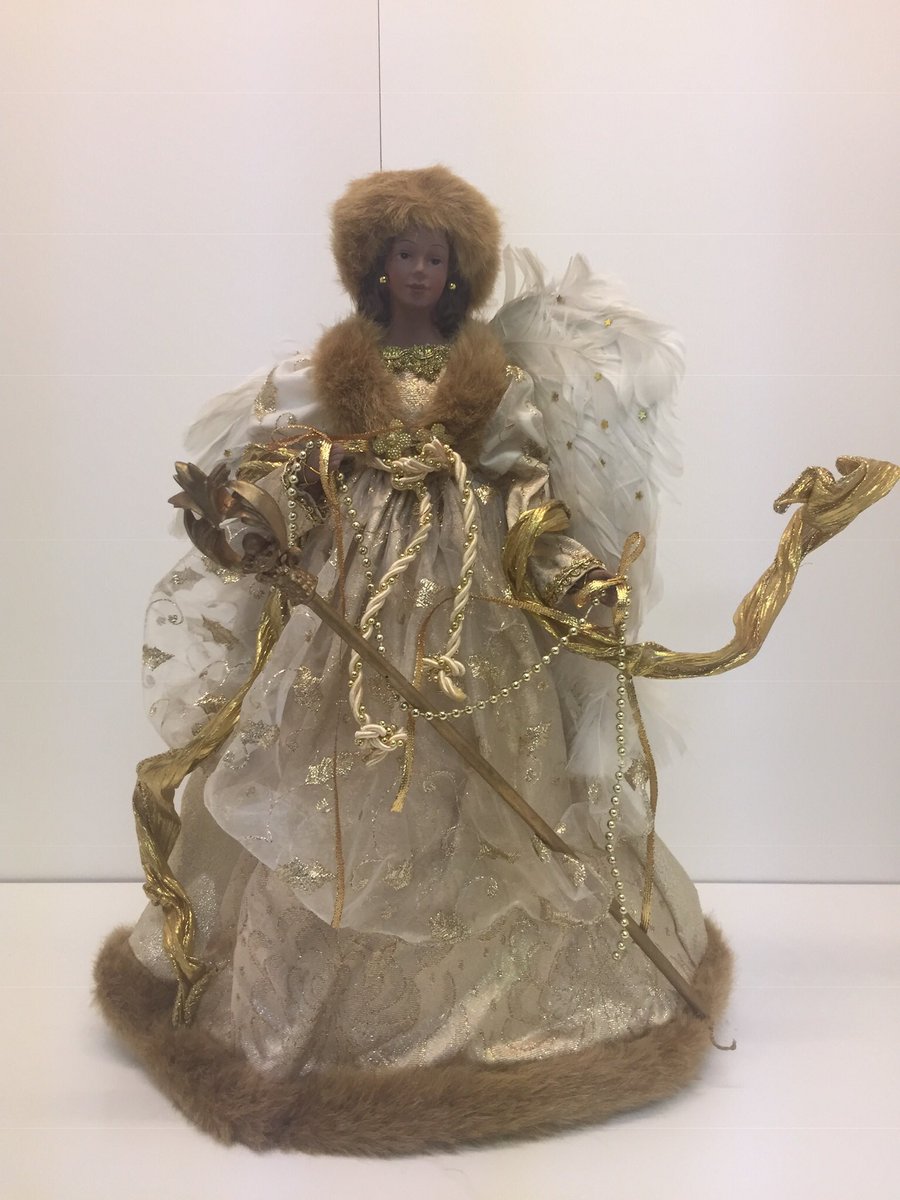 #blackdolls This tree topper reminds me of our fancy aunt from Detroit.