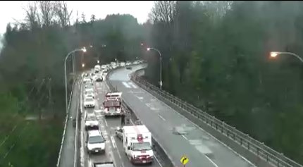 DriveBC's tweet photo. #BCHwy1 - Vehicle incident EB on the #CapRiver bridge in #NorthVan has the left lane blocked, expect heavy delays and congestion. #YVR https://t.co/OfvD3dmr67
