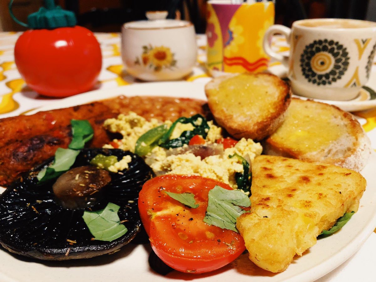Vegan megabreakfast. 2 sausage, sourdough toast, tofu scramble, beans, mushroom, tomato, hash brown, free coffee! Wonderbar.net