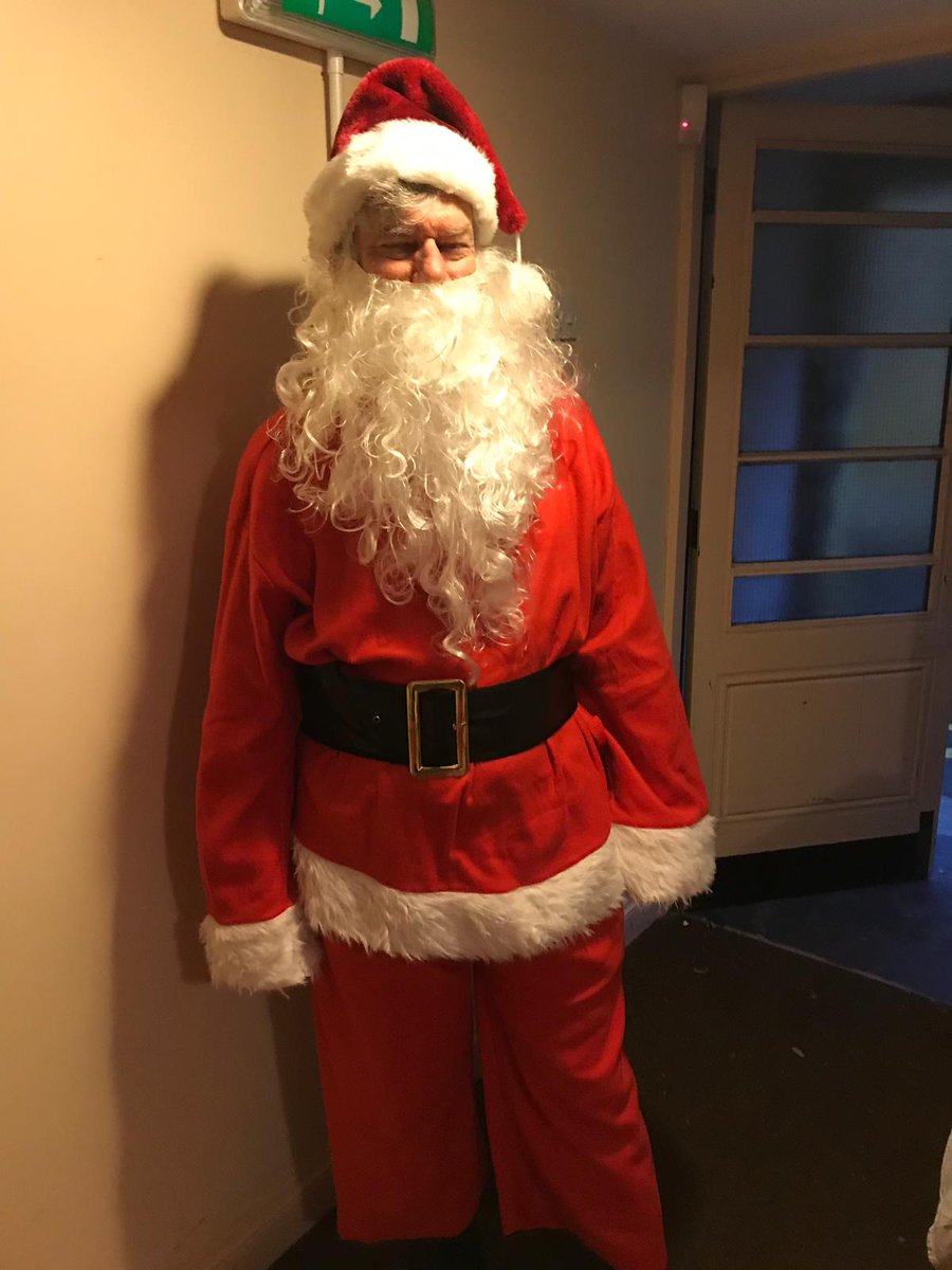 David_Llew's tweet photo. Hadn't realised the @Royal_Greenwich councillor rรดle stretched to being Father Christmas! Here about to make my entrance @StPetersSE18 to 100+ excited children https://t.co/oZb16hObiu