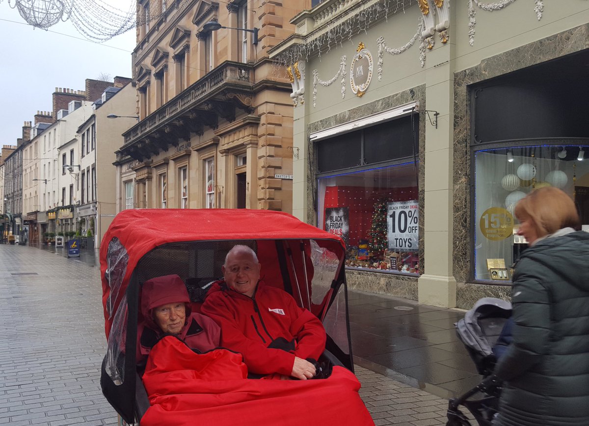 CWAPerth's tweet image. Out enjoying Perth Christmas market with the help of Cycling Without Age volunteer pilots.