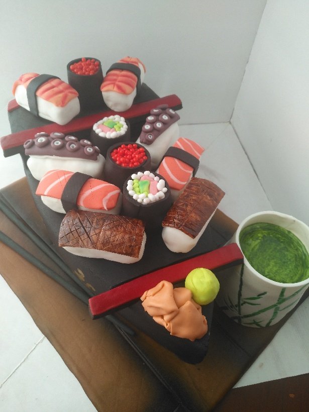 freefoodies's tweet photo. #Foodporn Alert! Beautiful Sushi Boat Cake my wife did for an auction. She has so much patience #yummy https://t.co/jFcbzVf4JS