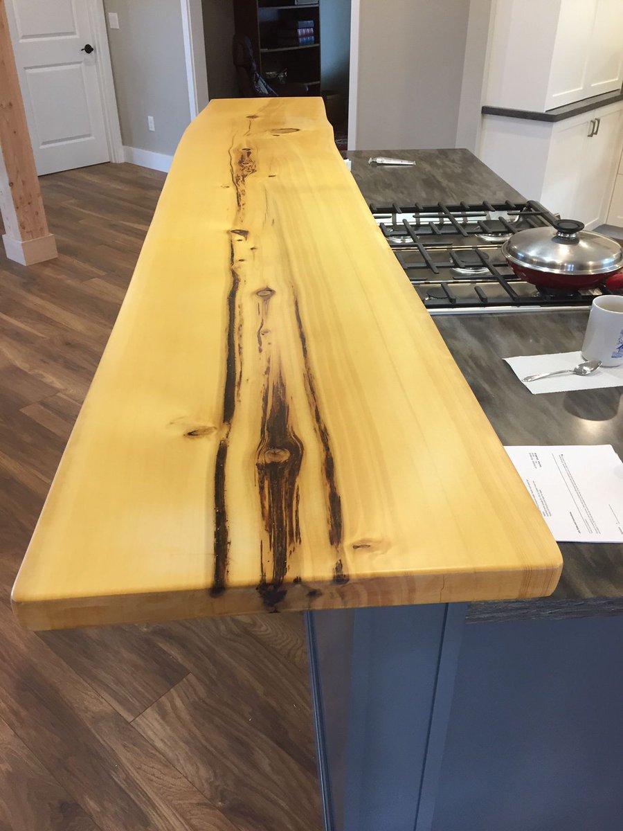 Beautiful clear finish on spruce bar top for a custom kitchen. 

🍁🍂🍃🌿🍁🍂🍃🌿🍁🍂🌨

#woodworking #juneau #spruce #remodel #highend #alaska #veneer #customcabinets #interiordesign #customcabinetsmaker #cnc #liveedge #sitkaspruce #localwoods #bartop #paintedcabinets