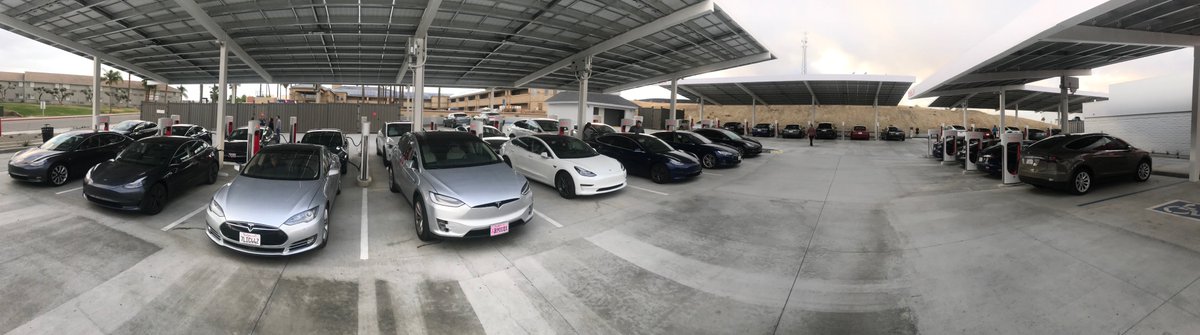 RPaulCrawford's tweet photo. On my recent annual Thanksgiving NorCal-SoCal sojourn, found the Kettleman City Supercharger at full capacity. For these keeping track at home, that is 40 Supercharger stalls. Full. Wow. Loved the fun scene in the lounge and enjoyed the mocha. @Tesla is ascendant! ❤️ https://t.co/b8GluOrCMx