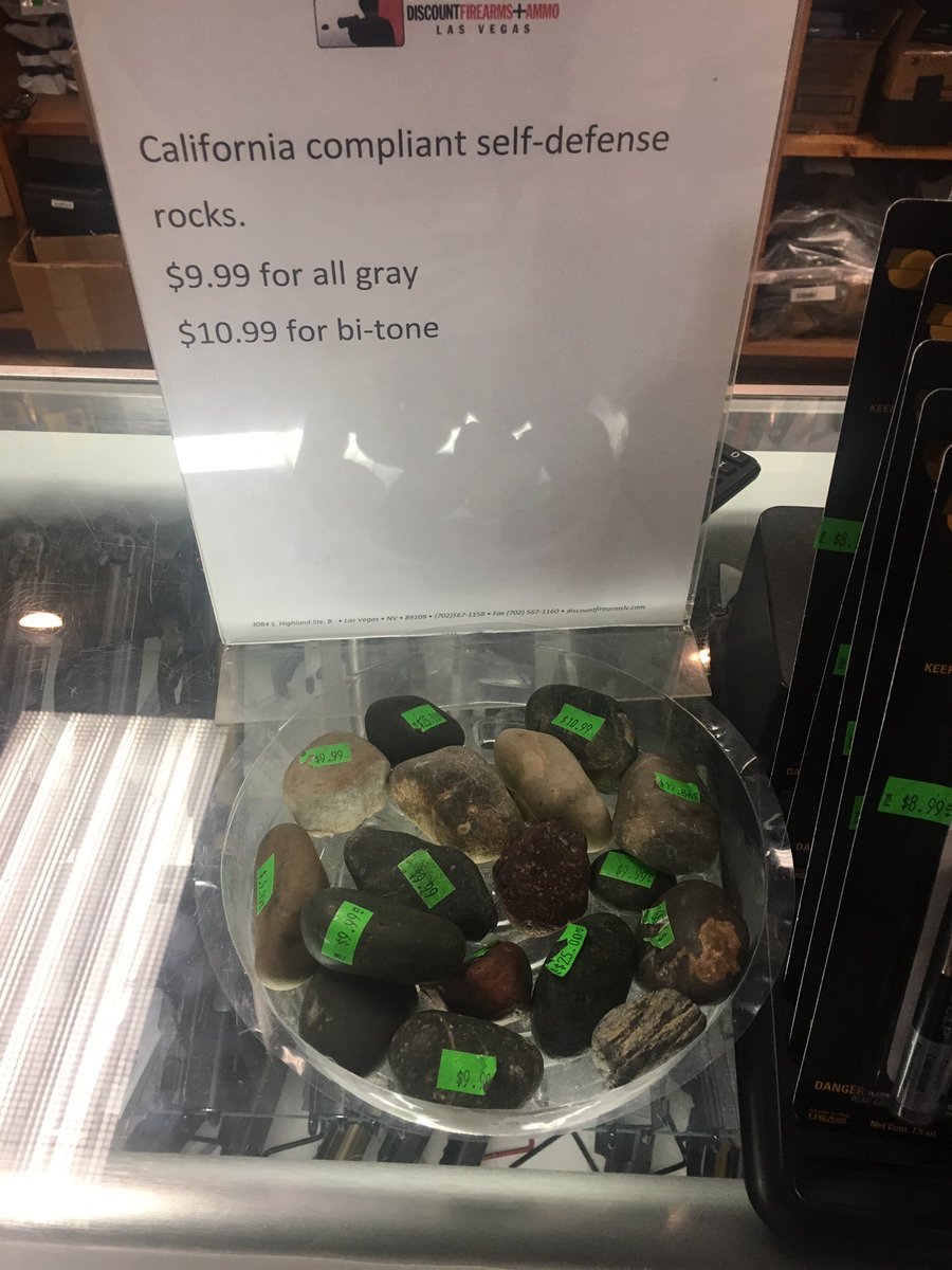 LawyerCat_'s tweet photo. At the Vegas gun range, if you ask which weapons are California compliant, they point you to this box of rocks lol https://t.co/HMa4JamOWA