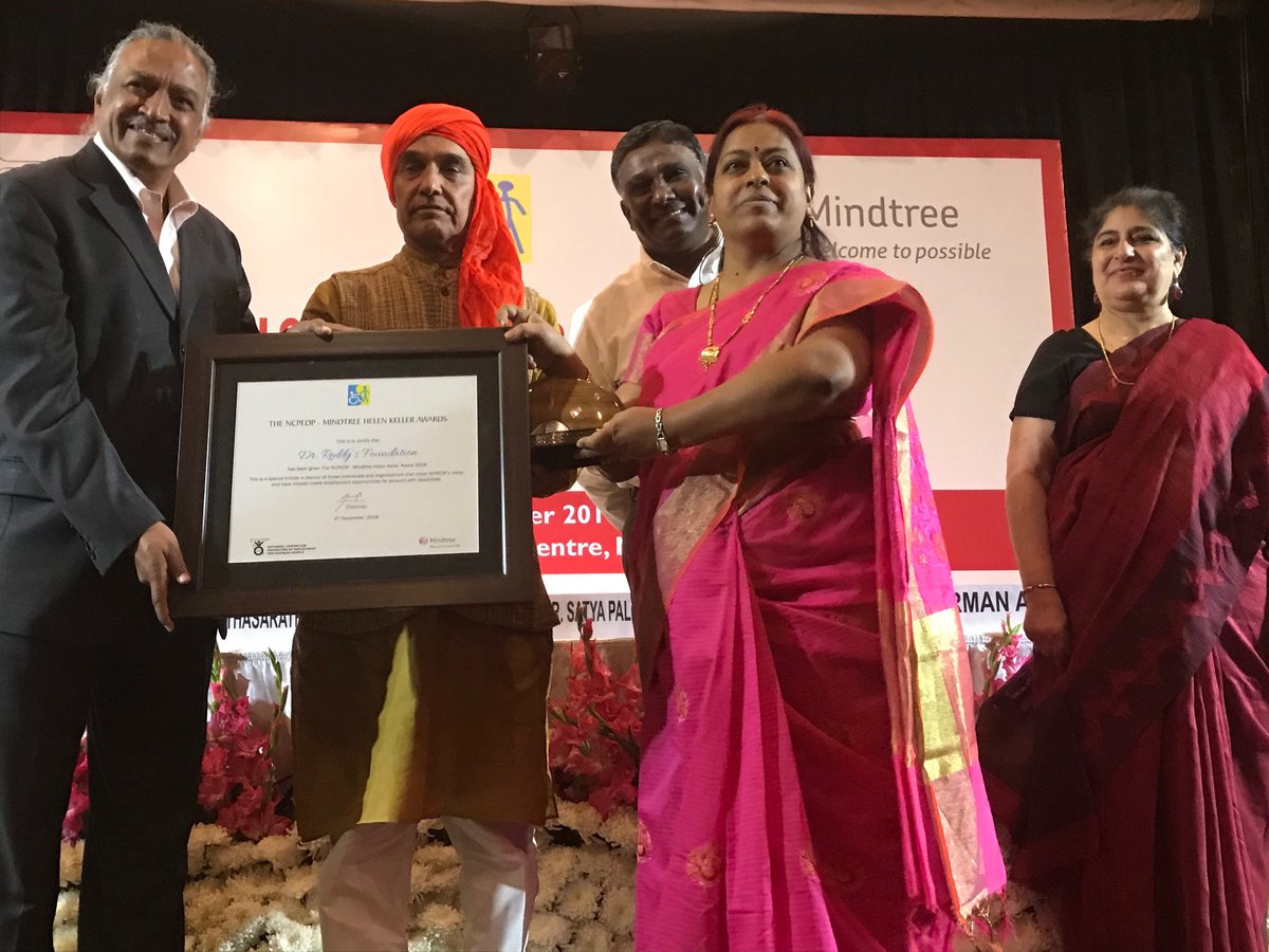 ncpedp_india's tweet photo. Ms Srilakshmi B receives the NCPEDP Mindtree Helen Keller Award 2018 on behalf of @DRFLivelihoods from Dr Satya Pal Singh, Hon’ble MoS @HRDMinistry , @nspartha @armanaly and Mr Arun Seth! #HKA2018 @Mindtree_Ltd @SCPwD https://t.co/5f4pxfJnub