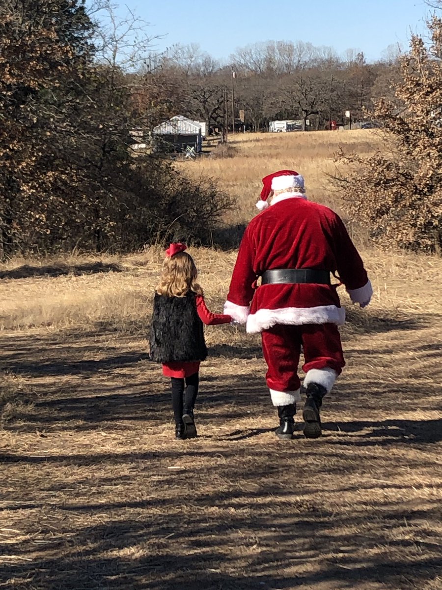 She is at the point of true belief and was so thrilled to take a walk with Santa and talk to him for a bit!