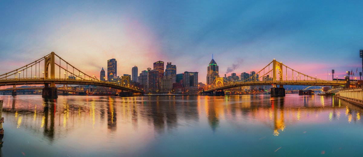 DaveDiCello's tweet photo. Usually without any clouds in the sky over #Pittsburgh, there isn't a lot of color, but that wasn't the case on this particular morning. Soft pink tones and the warm glow of the city complemented the deep blue sky in this panorama from the North Shore. https://t.co/ondE16cvEG