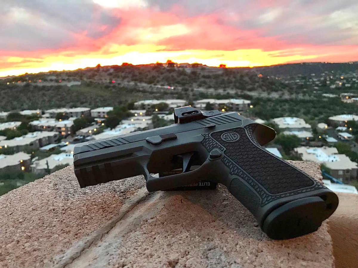 sigsauerinc's tweet photo. A beautiful view from @BottleBreacher HQ. #MyP320 #Xcarry @grayguns https://t.co/kcmhyPvynY