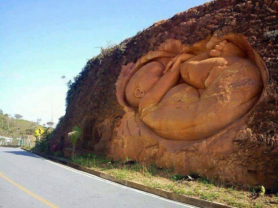 InfiniteBit's tweet image. Pregnant  Mountain" by artist Dubian Monsalve is a Colombian roadside tribute to "the woman that gives life". This is incredible. &amp;lt;3