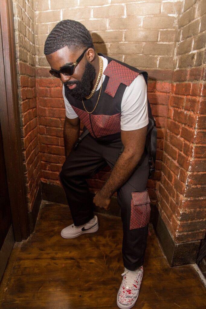 ShaySAL_'s tweet photo. It still hasn’t sunk in what 2018 has given me, go for your dreams and make them your reality. @AfroB_ wearing one of my first designs made from scratch and custom kicks, head to toe in my creativity for his FIRST headhline show ! Yo momma imma designer 🤯🤪 https://t.co/QHjr1RnZTp