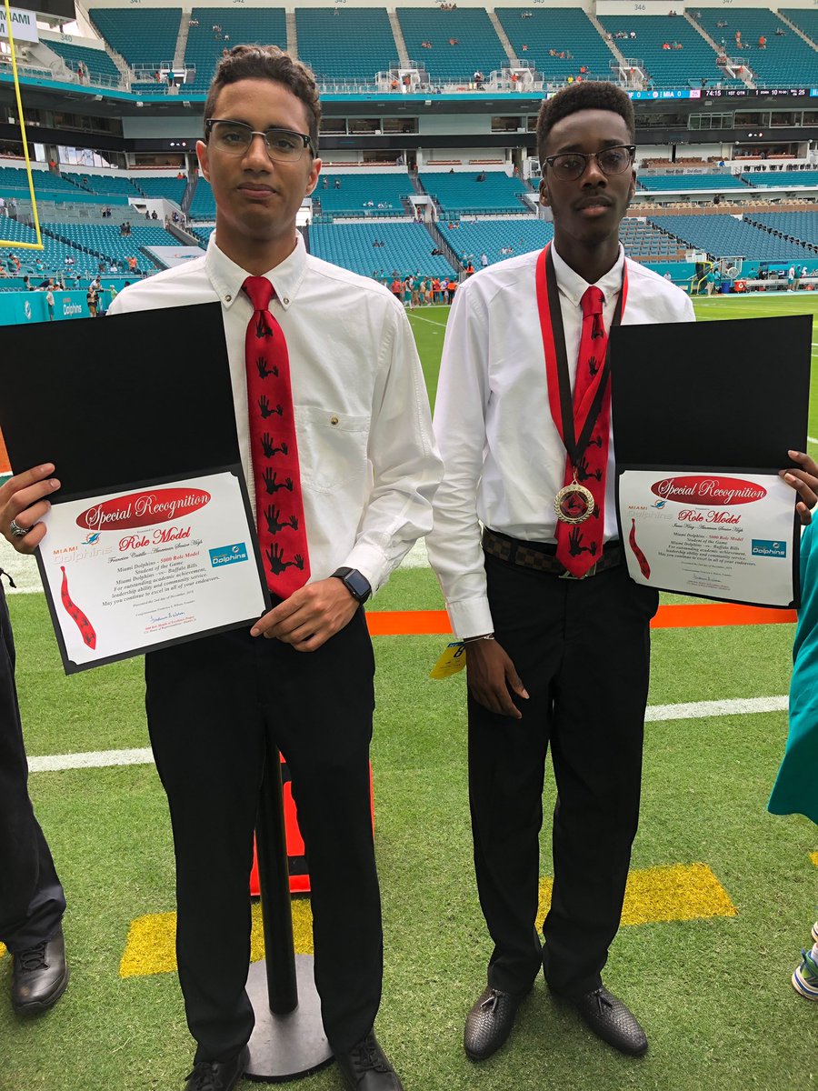 7011patriots's tweet photo. AHS #5000RoleModel students Honored by #MiamiDolphins.  Well done 👍 Francisco and Isaac.  Keep leading by example @MiamiSup @MDCPS https://t.co/9zMPcImcwk