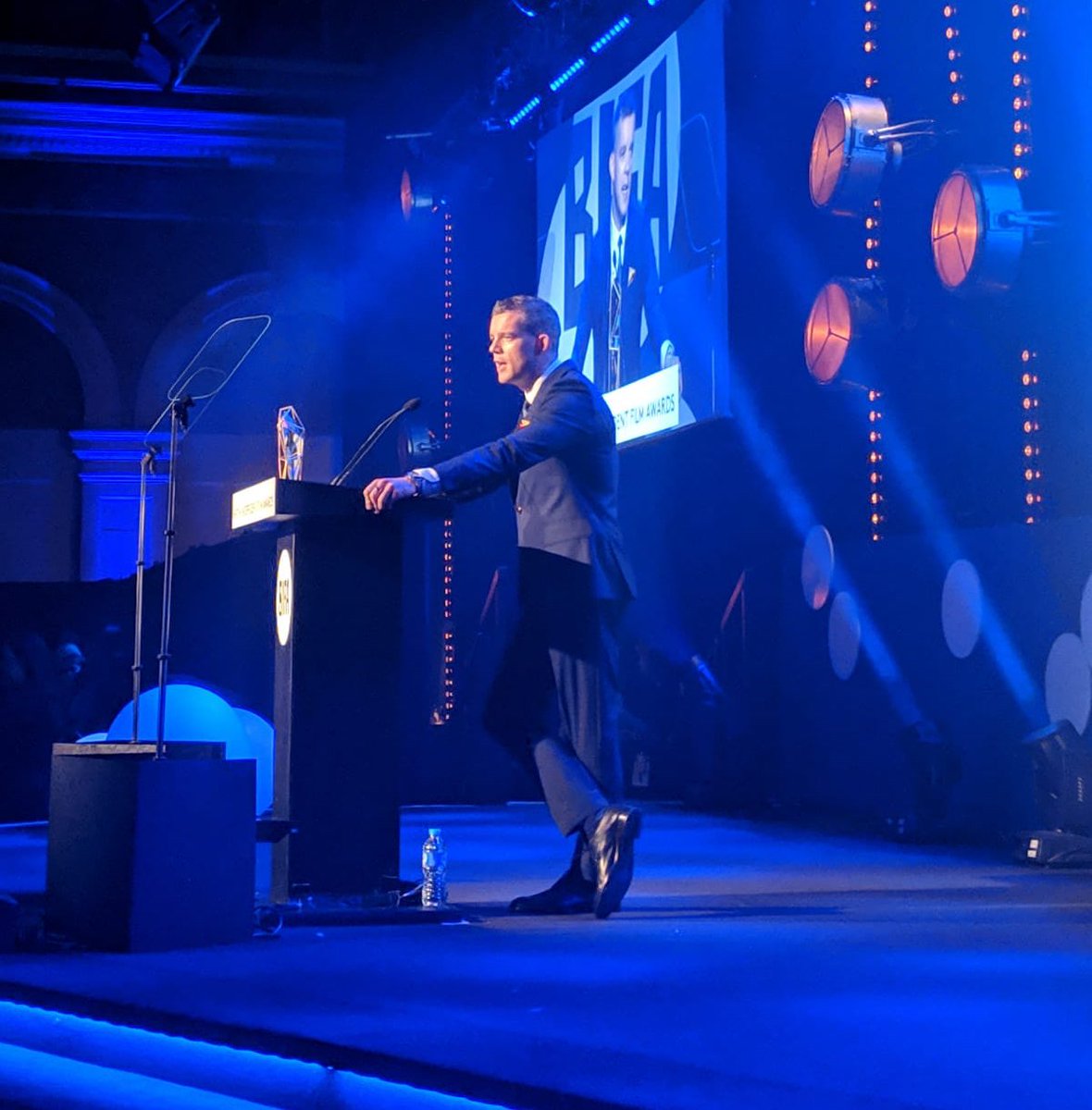 Host Russell Tovey on stage at BIFA 2018