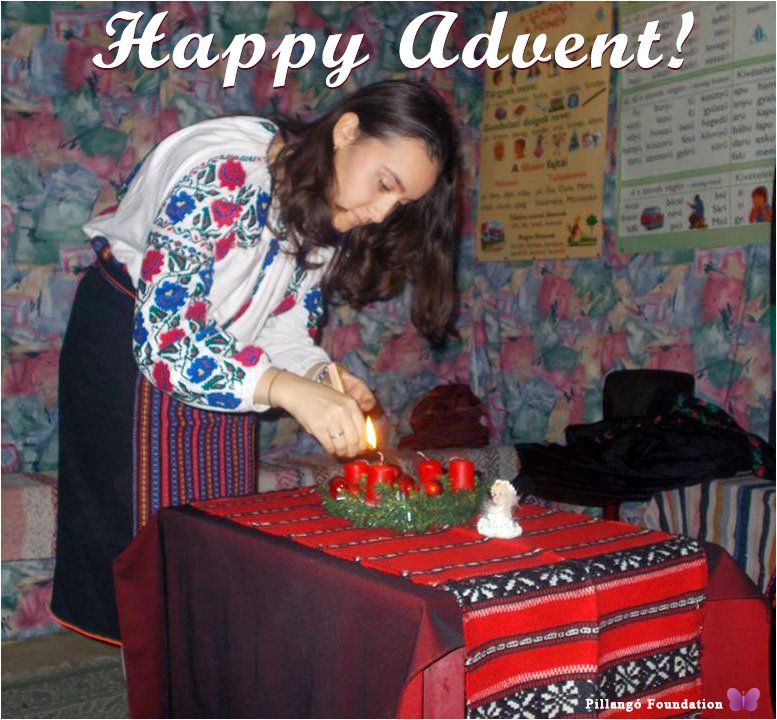 PillangoNews's tweet photo. We wish you a happy #Advent Season! Pic: #Csángó #Hungarian girl from the village of #Trunk in #Moldova, eastern Romania, lighting a candle on a #wreath. https://t.co/5QYhlk2pU4