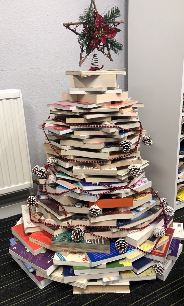 beckylibrary's tweet photo. We are starting to look festive in @BDCFT library! Well done to Jean for creating our book tree 🌲. Today is also the start of our #elfpromotion of library resources - more on that later... https://t.co/zLAFVGBvgp
