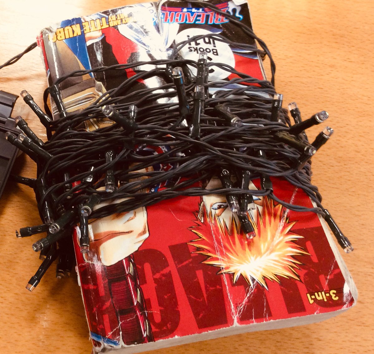 HazeleyLibrary's tweet photo. This is how ⁦@HazeleyLibrary⁩  stores its lights...using a  pre-loved book 🎄#tangledlights #christmaslights https://t.co/c5qcUYDXcQ