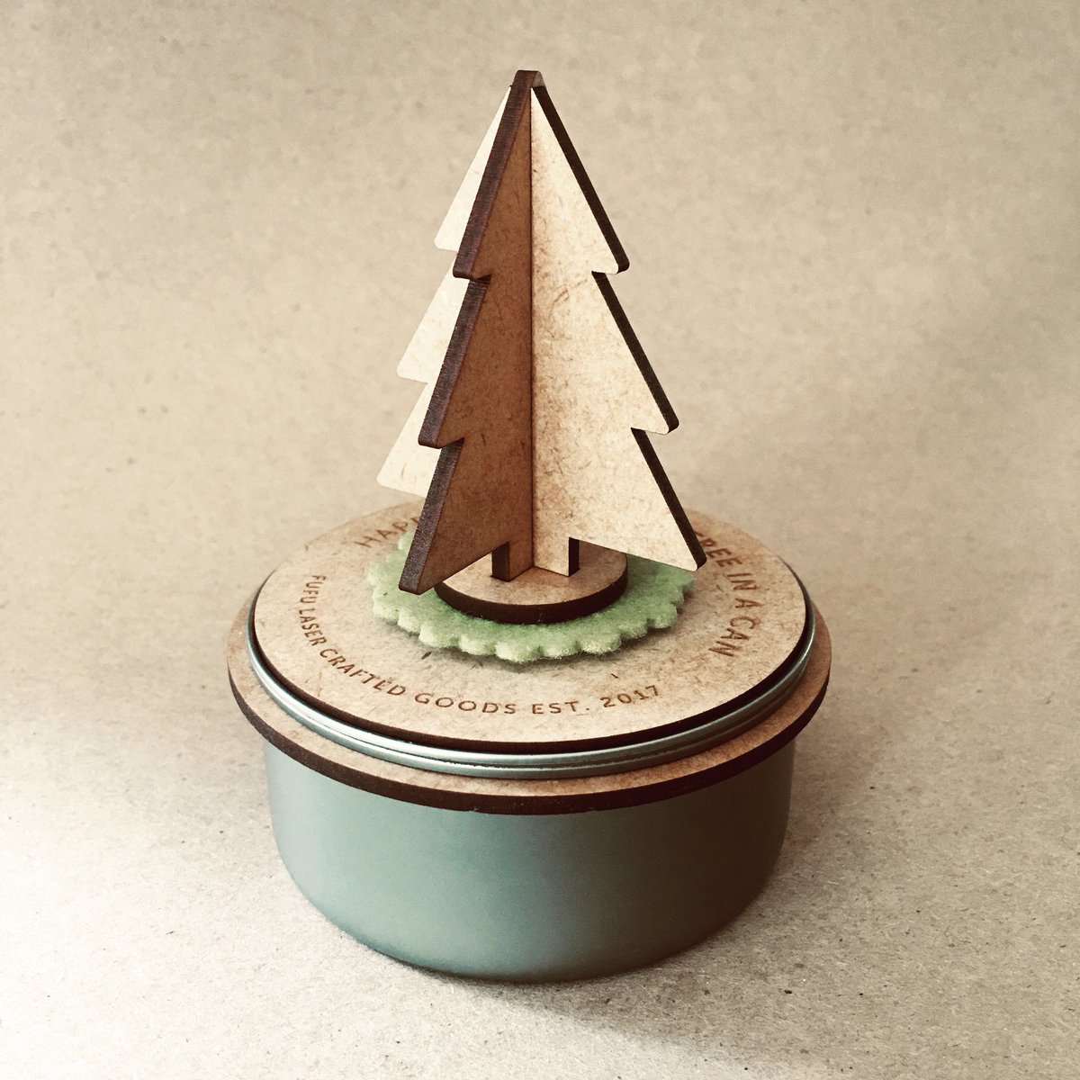 studioFUdesign's tweet photo. We have been making some fun items for the festive season. Upcycling our cats tuna cans into small Xmas trees. #lasercut #treeinacan #happyholidays #lasercrafted #knysna #sedgefield #ruigtevlei #FUFU #gifts #upcycled #tincan #tourism #westerncape #festiveseason #xmastree #tree https://t.co/FKQeCoPPv4