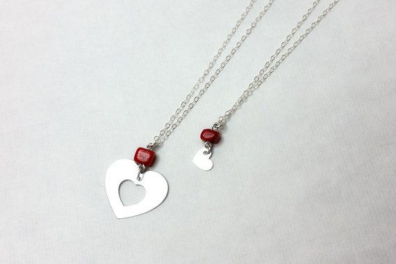 knooopMe's tweet photo. Fall in love with your little girl all over again. This sparkling mother and daughter Heart sterling silver necklace set makes a fitting reminder of just how lucky you are to have her in your arms. https://t.co/iyX1xRx4lL  #handmade #necklace #jewelry https://t.co/dR3ySPHZ9d