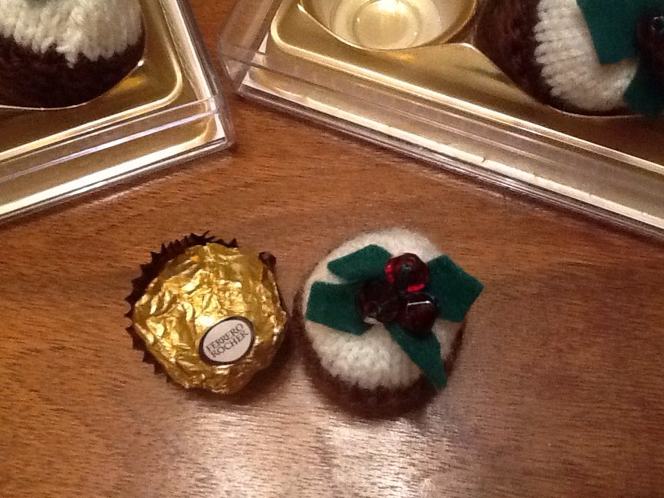 Look what Hilary has given for Bedford Hospital Tuesday Stall.  Knitted Christmas Puddings containing Ferrero Rocher chocolates.  Thank you so much.  They will add to the decorations of Christmas Dinner tables.