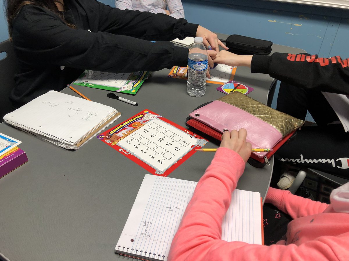 charlestull's tweet photo. Let’s talk Math! 6th grade @LarsonMS Ss determining what does not belong with @HayesBarn @CappusoKathy problem-solving and converting fractions #RebelMath continuing to build our skills #rebelations https://t.co/PObooCFExS