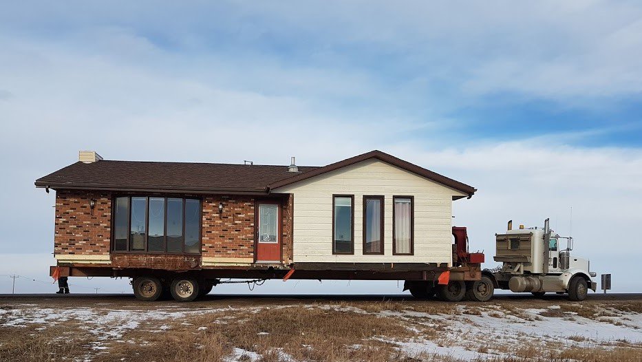 Neufeldbuilding's tweet photo. William, Ryan Harder, Boston and Matthew loaded this home in the Elrose area and moved it to the Broderick area. https://t.co/fFveeGSUrC