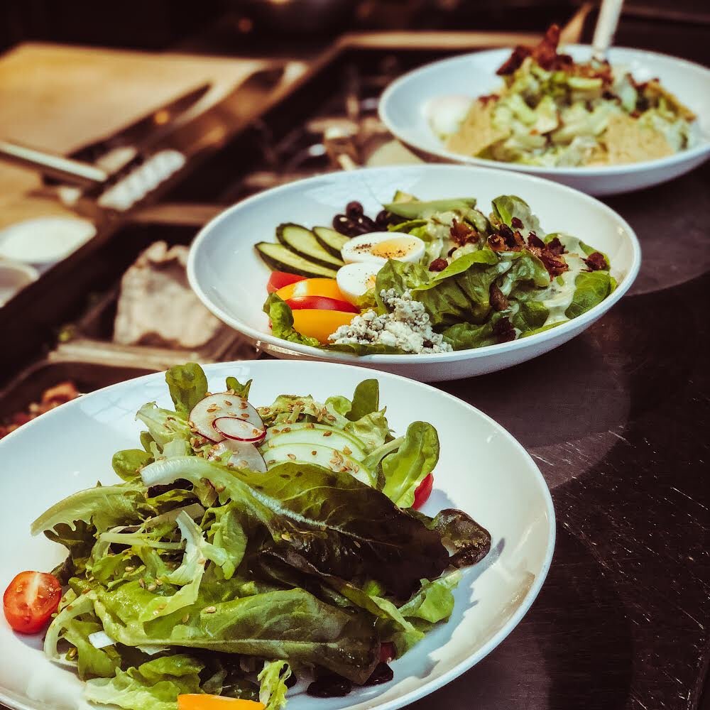 Salad plating is underway. Our crisp, leafy greens are the perfect way to get your veggies in. Try our Romaine, Artisanal Greens, Tuscan Kale and Forest Mushroom, Vine Ripened Tomato, or our Cobb (offered at lunch). #yyc #yyceats #stephenave #iamdowntown #murrietas